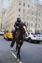 NYPD Mounted Unit police officer provides security at Rockefeller Plaza in Midtown Manhattan