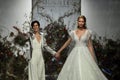 Designer Madeline Gardner and model walk the runway during the Morilee by Madeline Gardner Spring 2020 bridal fashion show