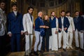 Designer Reem Acra, Joseph Abboud and male models pose on the runway during the Reem Acra Bridal Spring 2020 fashion collection