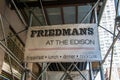 Sign on scaffolding at construction site at front entrance of Friedman`s Restaurant at the Edison Hotel on 47th Street in