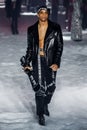 Cordell Broadus walks the runway at the Philipp Plein fashion show