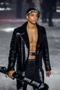 Cordell Broadus walks the runway at the Philipp Plein fashion show