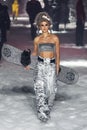 Georgia Fowler walks the runway at the Philipp Plein fashion show