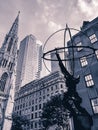 An angled view of the Atlas statue facing Saint Patrick s Cathedral church. Royalty Free Stock Photo