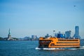 Staten Island Ferry crossing the New York Bay, with views of the Statue of Liberty and the New York Royalty Free Stock Photo