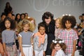 NEW YORK, NY - OCTOBER 19: Designer Rany Mendlovic walks the runway with models during the Charm preview