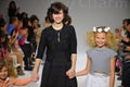 NEW YORK, NY - OCTOBER 19: Designer Rany Mendlovic walks the runway with models during the Charm preview