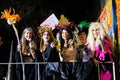 Group of cute and scary witches at NYC Village Halloween parade