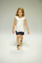 NEW YORK, NY - OCTOBER 18: A model walks the runway during the Chloe preview at petitePARADE Kids Fashion Week