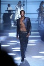 Cordell Broadus walks the runway at the Philipp Plein fashion show