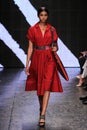 NEW YORK, NY - SEPTEMBER 08: Model Imaan Hammam walks the runway at Donna Karan Spring 2015 fashion show