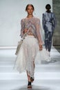 NEW YORK, NY - SEPTEMBER 05: A model walks the runway at the Zimmermann fashion show