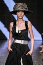 NEW YORK, NY - SEPTEMBER 08: Model Yumi Lambert walks the runway at Donna Karan Spring 2015 fashion show