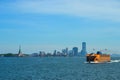 New York, NY - Staten Island Ferry crossing the New York Bay, with views of the Statue of Liberty and the New York