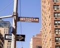 Landscape daytime image of the iconic Amsterdam Avenue street sign in New York CityÃ¢â¬â¢s upper