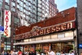 Tourist waiting to enter the iconic Katz\'s Delicatessen, also known as Katz\'s of New York City