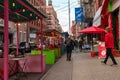 Colorful restaurant busy street scene Little Italy New York