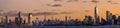 Dramatic panorama of New York Harbor at sunrise. Highlighting Statue of Liberty, World Trade Royalty Free Stock Photo