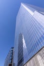 One World Trade Center skyscraper reflection on a side of Four World Trade Center building