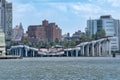 Wide horizontal view seen from the Hudson River of Little Island at Pier 55. An artificial