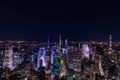 Night panorama of New York City, view at Bryant park and Paramount Building highlighted in pink Royalty Free Stock Photo