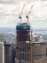 New York, NY, USA. New skyscrapers under construction. Construction site with cranes, elevators and scaffolding Royalty Free Stock Photo