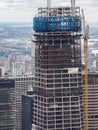 New York, NY, USA. New skyscrapers under construction. Construction site with cranes, elevators and scaffolding Royalty Free Stock Photo