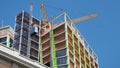 New York, NY, USA. New skyscrapers under construction. Construction site with cranes, elevators and scaffolding Royalty Free Stock Photo