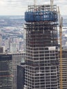 New York, NY, USA. New skyscrapers under construction. Construction site with cranes, elevators and scaffolding Royalty Free Stock Photo