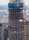 New York, NY, USA. New skyscrapers under construction. Construction site with cranes, elevators and scaffolding Royalty Free Stock Photo