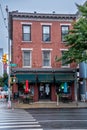 New York, NY - USA - Oct 2,2022 - Vertical image of the historic red brick Landmark Irish tavern, A HellÃ¢â¬â¢s Kitchen icon that