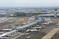 New York, NY, USA - September 5, 2021: Aerial view of JFK airport terminal, tower and apron with Delta airlines airplanes