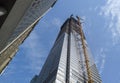 New York, NY, USA. New skyscrapers under construction. Construction site with cranes, elevators and scaffolding Royalty Free Stock Photo