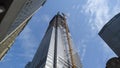 New York, NY, USA. New skyscrapers under construction. Construction site with cranes, elevators and scaffolding Royalty Free Stock Photo