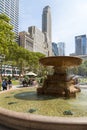 People relaxing in the Bryant Park in summer, sunny day. Royalty Free Stock Photo