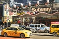 Rush hour and traffic jam with modern yellow taxi cab by 7th ave near Times Square in Manhattan Royalty Free Stock Photo