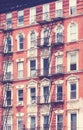 New York old building with fire escape, color toning applied, USA Royalty Free Stock Photo