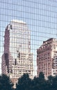 New York old buildings reflected in windows of a modern skyscraper Royalty Free Stock Photo