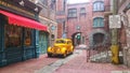 New York. 2018. Old retro yellow cab taxi near service center chrysler and Plymouth. On the street of antique new york.