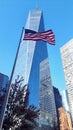 New York One World Trade Center Skyscraper and USA waving flag Royalty Free Stock Photo