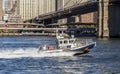 New York Police Department controls with a speed boat the river