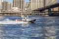 New York Police Department controls with a speed boat the river