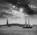 New York sailboat sunset and Statue of Liberty Royalty Free Stock Photo
