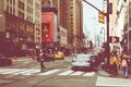 NEW YORK - SEPTEMBER 2, 2018: New York City street road in Manhattan at summer time, many cars, yellow taxis and busy people walk Royalty Free Stock Photo