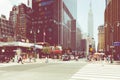 NEW YORK - SEPTEMBER 2, 2018: New York City street road in Manhattan at summer time, many cars, yellow taxis and busy people walk Royalty Free Stock Photo