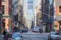 Soho street with cast iron buildings in the morning in New York