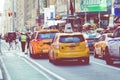 NEW YORK - SEPTEMBER 2, 2018: Yellow cab speeds through Times Sq