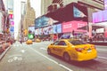 NEW YORK - SEPTEMBER 2, 2018: Yellow cab speeds through Times Sq Royalty Free Stock Photo