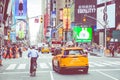 NEW YORK - SEPTEMBER 2, 2018: Yellow cab speeds through Times Sq Royalty Free Stock Photo