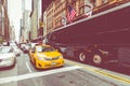 NEW YORK - SEPTEMBER 2, 2018: Yellow cab speeds through Times Sq Royalty Free Stock Photo